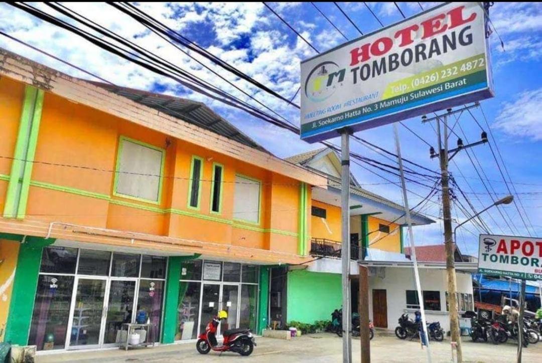 Oyo 93411 Syariah Hotel Tomborang Karema Exterior photo